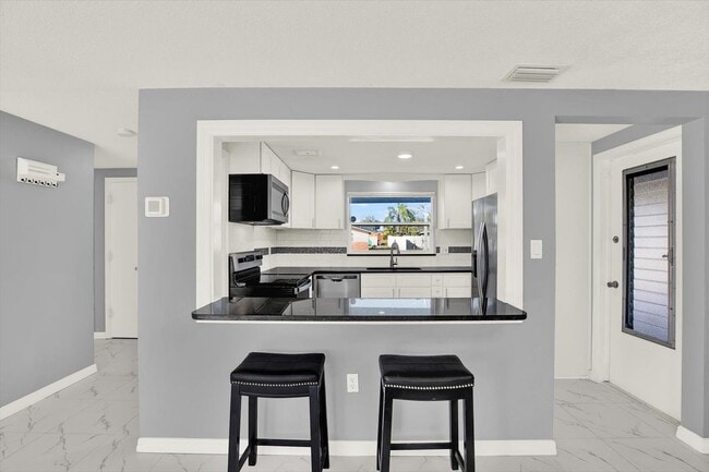 Building Photo - 7902 Canna Dr