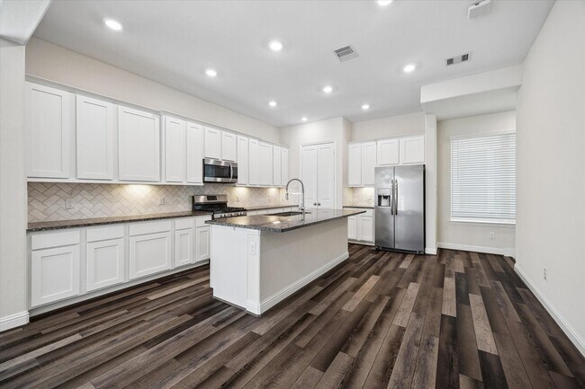 Foto del edificio - 1411 Adell Rose Ln