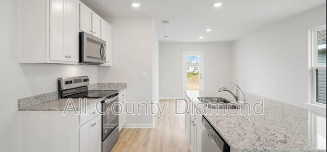 Foto del edificio - 6615 Kettles St