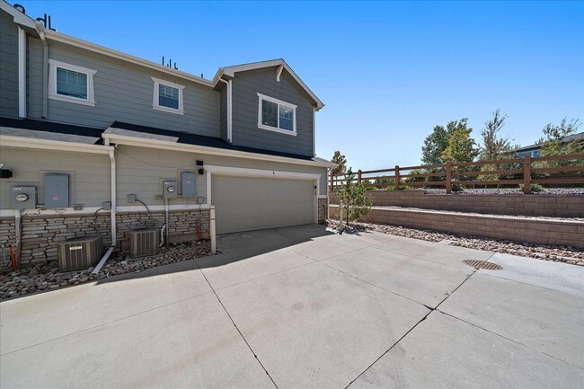 attached 2 car garage - 16836 E 118th Dr