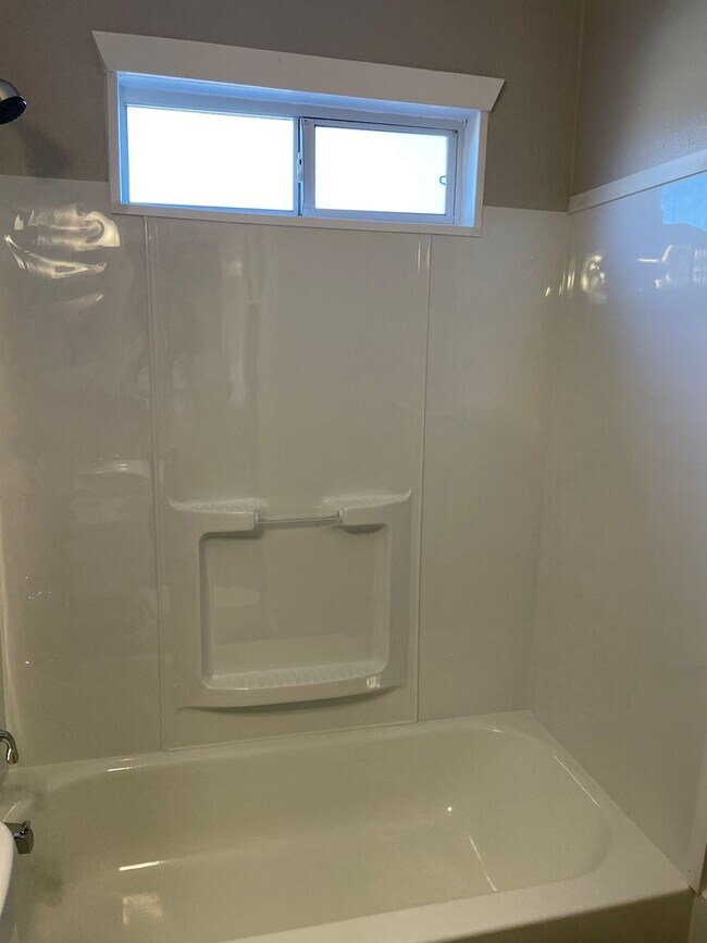 Building Photo - Great property with new paint and remodeled bathroom.