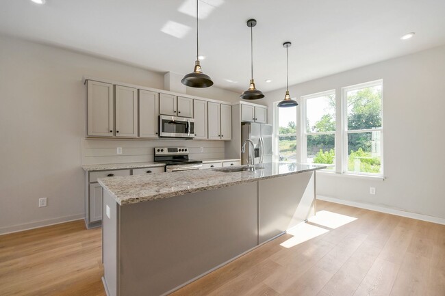 Building Photo - Sleek 2-Bedroom/2.5 Bath Townhome with Gar...