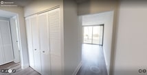 This contemporary 2-bedroom, 1-bathroom apartment in Herndon, VA offers 740 square feet of thoughtfully designed living space. The open-concept layout maximizes functionality, featuring a spacious living area with large sliding glass doors that flood the room with natural light. The newly renovated kitchen boasts white cabinetry, granite countertops, and stainless steel appliances, creating a sleek and efficient cooking space.

Both bedrooms are generously sized, with the primary bedroom measuring 130 square feet. Plush carpeting in the bedrooms adds warmth and comfort, while the main living areas showcase durable, wood-look flooring. The modern bathroom features a granite vanity top and ample storage.

Throughout the apartment, neutral tones and clean lines create a fresh, inviting atmosphere. Recessed lighting and large windows ensure bright, airy spaces. Two hallways provide easy navigation between rooms. The apartment's single-floor layout and updated finishes make it an ideal choice for those seeking a contemporary, low-maintenance living space in a convenient Herndon location.