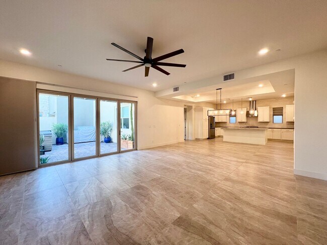 Building Photo - HIGHLY UPGRADED TOWNHOME IN TRILOGY SUMMER...