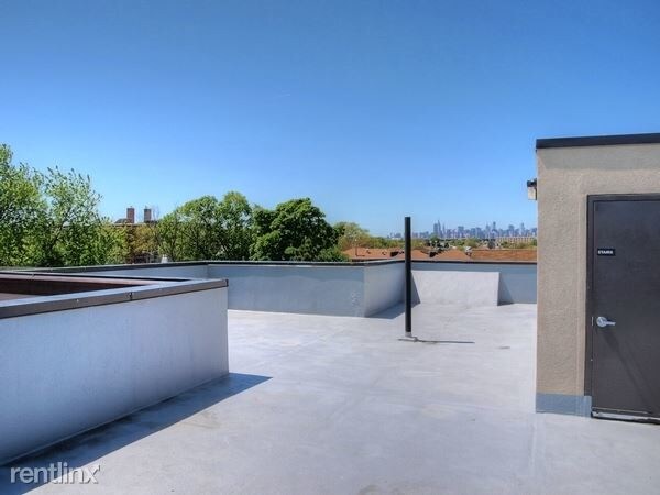 Building Photo - 1973 77th St