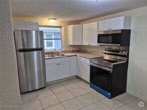 Building Photo - 1699 Ixora Dr
