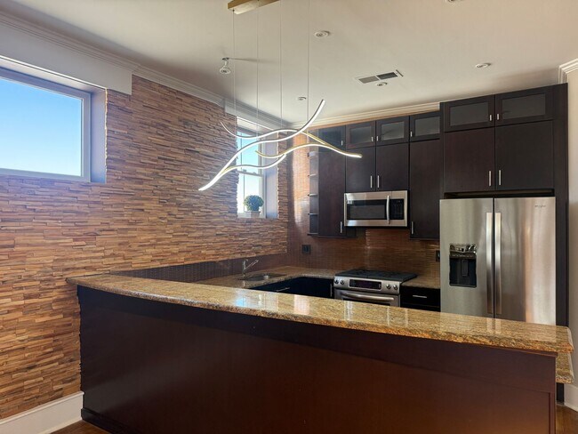 Foto del edificio - Completely Renovated Downtown Memphis Loft with Rooftop Skyline Views.