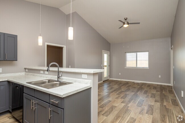 2BR, 2BA - 935SF - Living room - Jefferson Heights Apartments, LLC