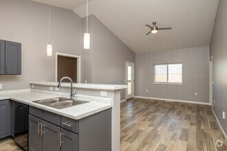 2BR, 2BA - 935SF - Living room - Jefferson Heights Apartments, LLC
