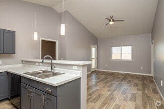 2BR, 2BA - 935SF - Living room - Jefferson Heights Apartments, LLC