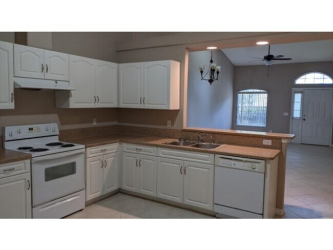 Building Photo - 3/2/1 duplex in Palm Coast, FL       www.W...