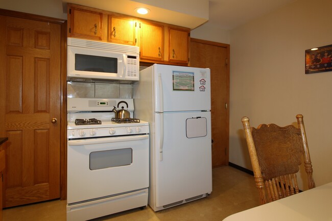 Refrigerator with automatic ice maker, gas range and OTR Microwave - 48 Miller St
