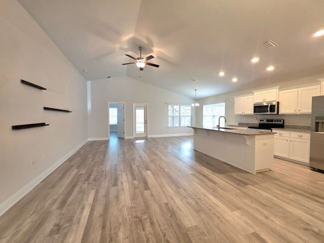 Building Photo - Bright, Open Layout | Screened Porch + Paver Patio | Move-In Ready