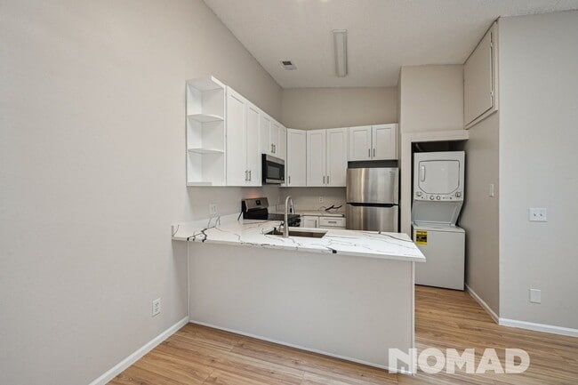 Building Photo - Charming 1BR Condo in Denver