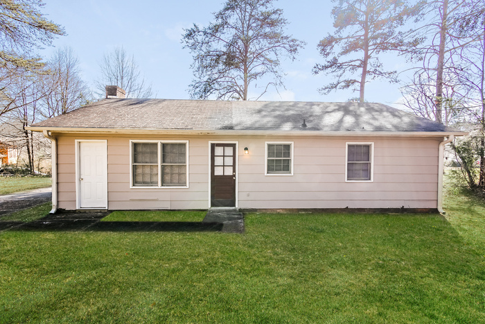 Building Photo - Inviting 4-Bedroom