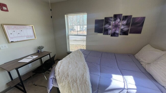 With 4 unique bedroom layouts and an open kitchen & living room, we know you'll feel right at home in one of our 4-Bed, 4-Bath flats! - Crawford Edge Apartments