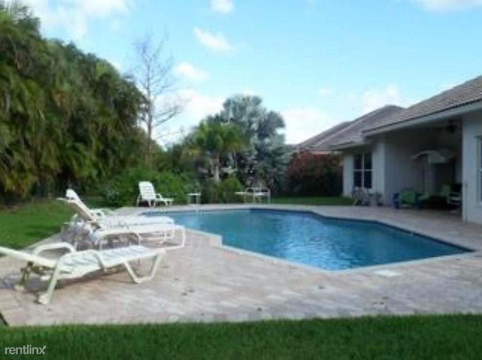 Foto del edificio - 4 br, 3 bath House - 102 NW 83rd Way