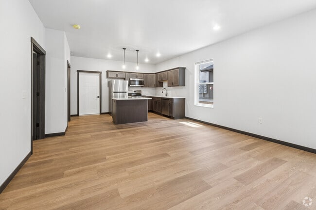 1BR, 1BA - 805SF - Kitchen and Living Room - Bartlett Crossing II