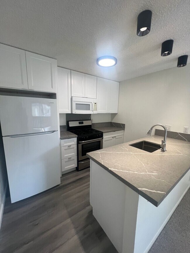 Foto del edificio - 1br/1ba/1pkg - Sun Rise