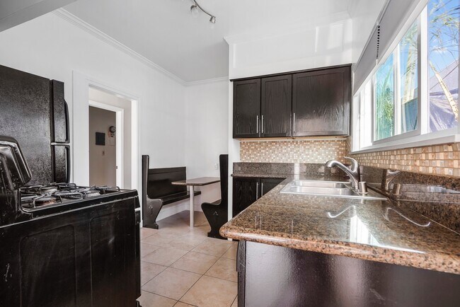 Granite and Tile Kitchen - 5965 Fountain Ave