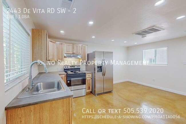 Building Photo - Completely Remodeled Unit In the SW!
