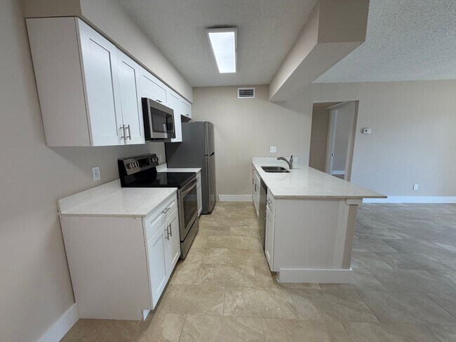 Foto del edificio - ANNUAL RENTAL - 1 BED / 1 BATH CONDO AT MYSTIC GARDEN