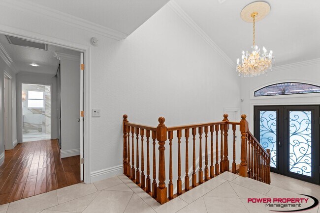Foto del edificio - Spacious 5-Bedroom Home with Modern Amenit...