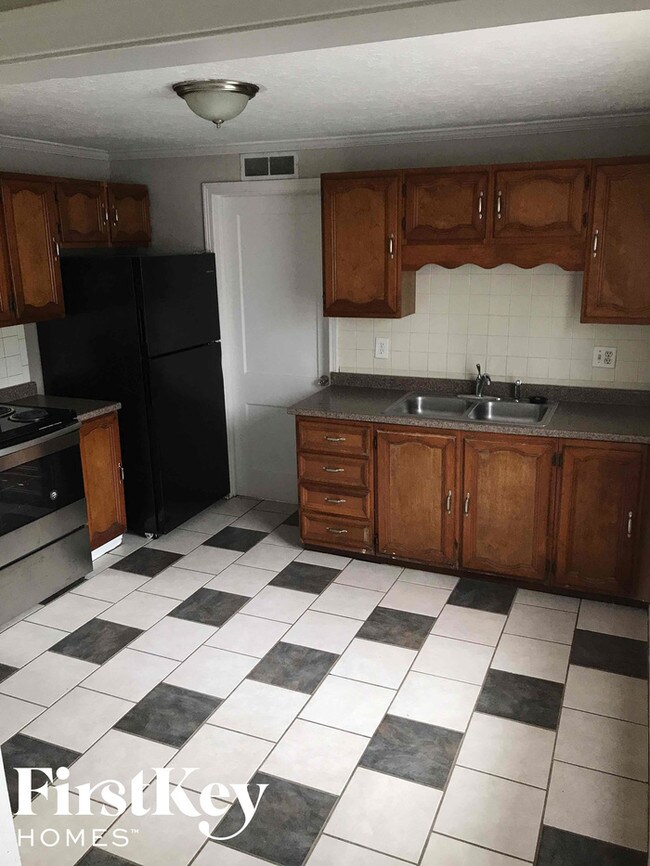 Foto del edificio - 7709 Sni a Bar Rd