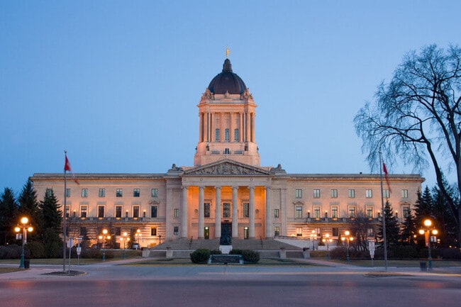 Manitoba legislative building in Winnipeg at dusk.