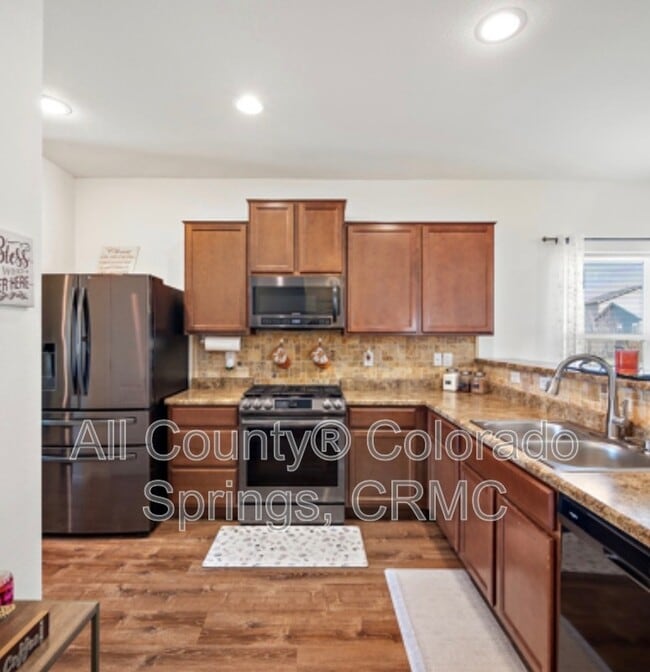 Building Photo - 10084 Thunderbolt Trail