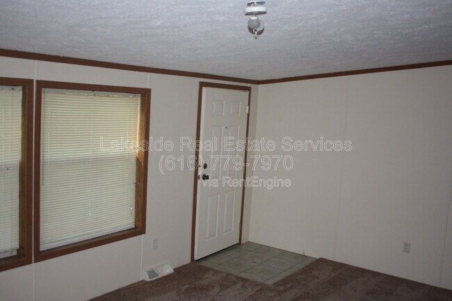 Building Photo - 10500 21 Mile Rd NE