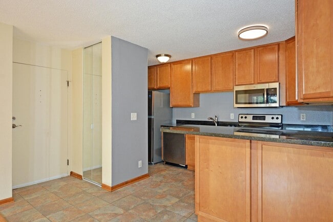 Foto del edificio - Charming 1-Bedroom Condo Available in Minn...