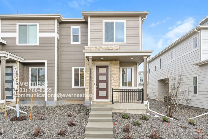 Primary Photo - Spacious and Stylish Townhome with Prime L...