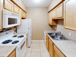 Kitchen With Large Double Sink - High Point East Apartment Homes