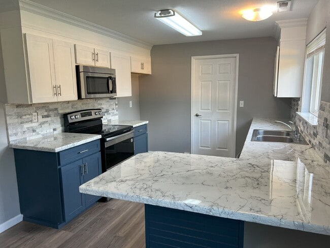 Building Photo - Jared and Travis Duplex