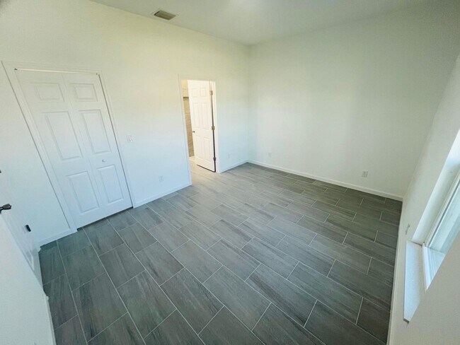 Building Photo - NEW CONSTRUCTION- Modern 3 Bed / 2 Bath Home in Lehigh Acres