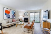 Located at 300 Hilary Way in Vallejo, CA, this single-floor, 2-bedroom, 2-bathroom residence offers a well-organized layout with a clean, modern aesthetic throughout. The combined living and dining area serves as the heart of the home, featuring light hardwood-style flooring, a tiled fireplace, and large sliding glass doors with vertical blinds that invite natural light and provide access to a private patio. The kitchen is designed for efficiency, with white cabinetry extending to the ceiling, white appliances, a double-basin sink, and light flooring that keeps the space feeling bright and cohesive. The primary bedroom is a comfortable retreat with carpeted flooring, multiple windows offering greenery views, and ample closet space. The second bedroom also features carpet, a sliding-door closet, and natural light. Both bathrooms are finished with wood-style flooring, tub-shower combinations, and clean white fixtures. A dedicated hallway connects the bedrooms and bathrooms, adding to the functional flow of the home. With three closets total, the residence provides generous storage. The entrance and patio round out the layout, adding convenience and a touch of outdoor living to this well-appointed Vallejo home.