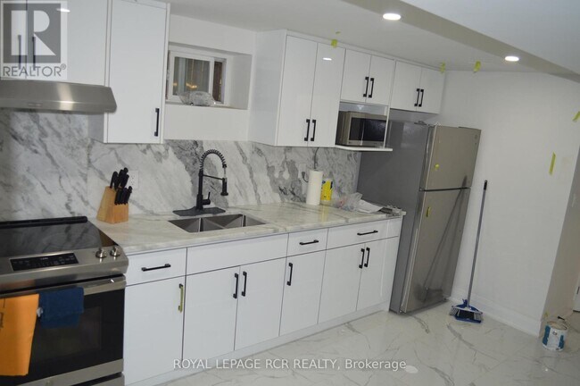 Photo du bâtiment - 36 Electro Rd