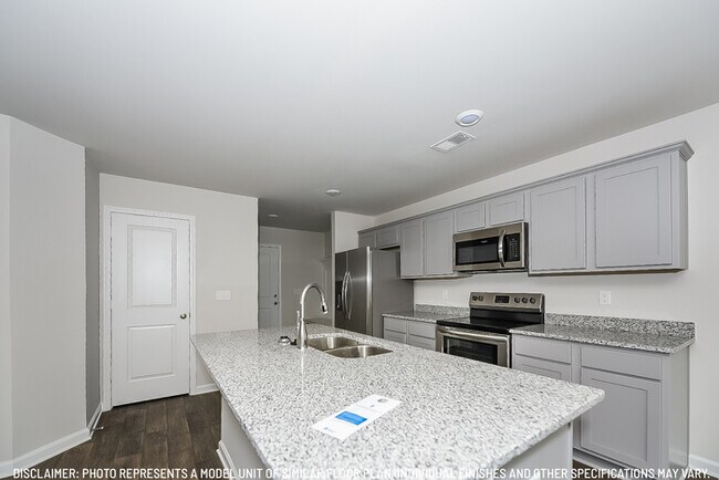 Building Photo - Brand New in Spring Meadow!