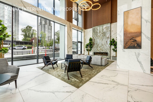 Building Photo - Luxury 2 Bed + Den Corner Home on the 52nd Floor at Gilmore Place