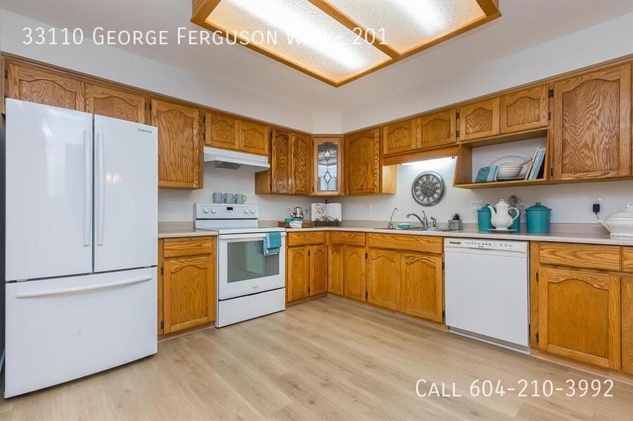 Primary Photo - Updated 55+ Condo with Covered Parking