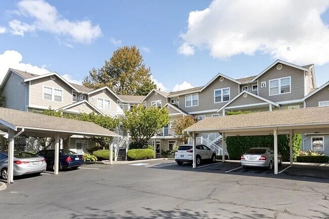 Foto del edificio - Well maintained ground level condo with ga...