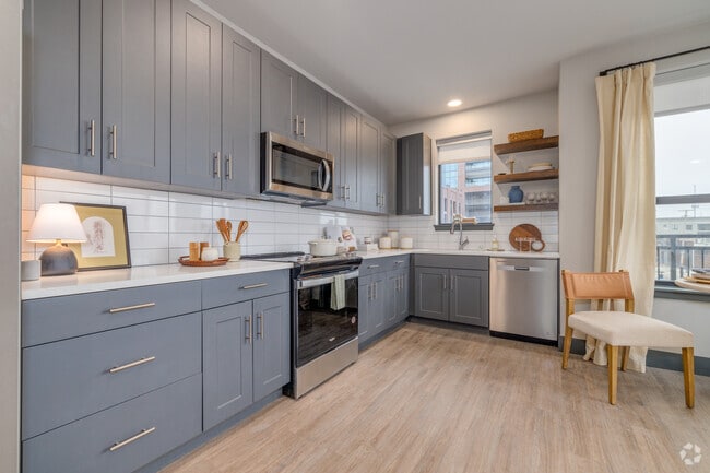 2BR, 2BA - 1072SF - Kitchen Area - Santa Fe Square Apartments