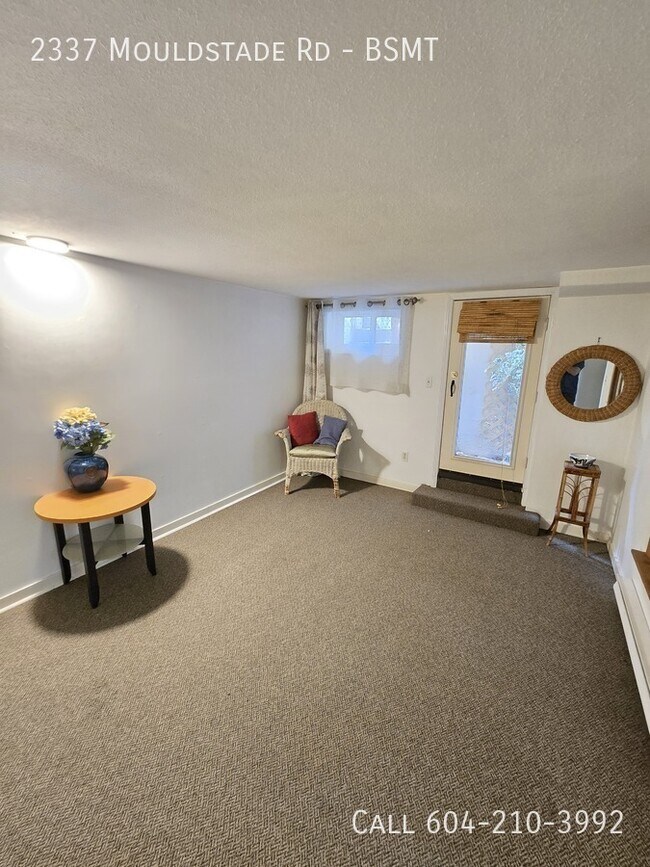 Photo du bâtiment - Cozy Basement Suite - Utilities Included