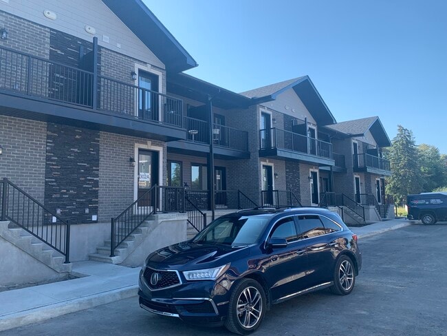 Photo du bâtiment - 300 Kooiman Av