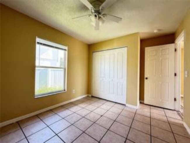 Building Photo - Charming 3-bed, 2-bath POOL home with 2-car garage. Features ceramic tile flooring, updated kitch...