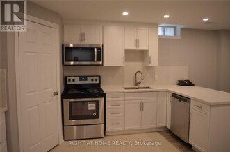 Building Photo - 5332 Floral Hill Crescent