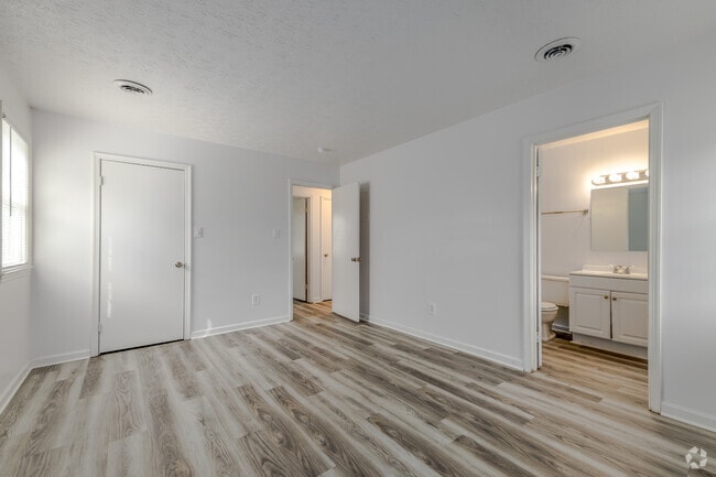 2BR, 1.5BA - 1,100SF - Primary Bedroom - Highlander