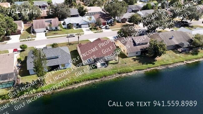 Photo - 704 49th St E House