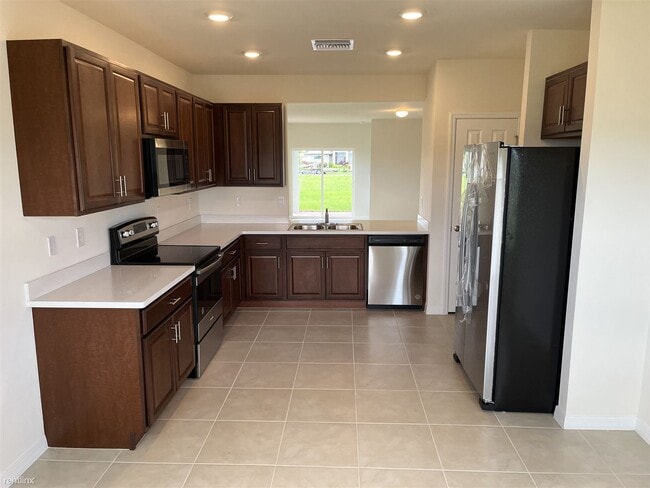 Building Photo - 3 br, 2 bath House - 1009 Northeast 11th S...